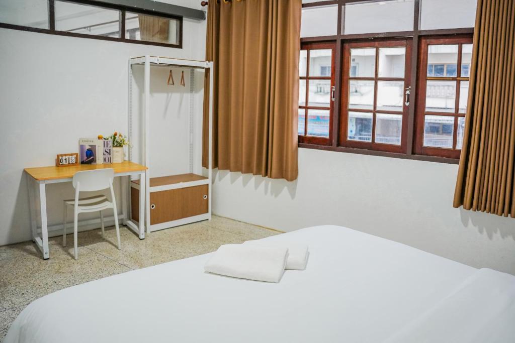Postel nebo postele na pokoji v ubytování Scenario Cafe and Hostel