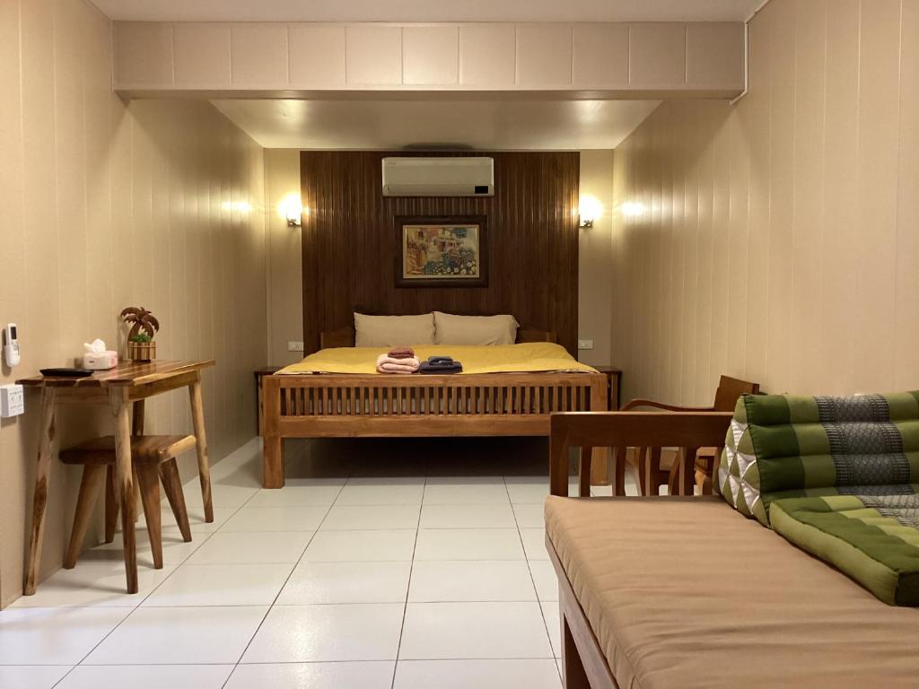 Posezení v ubytování Baan Khunsri Guesthouse