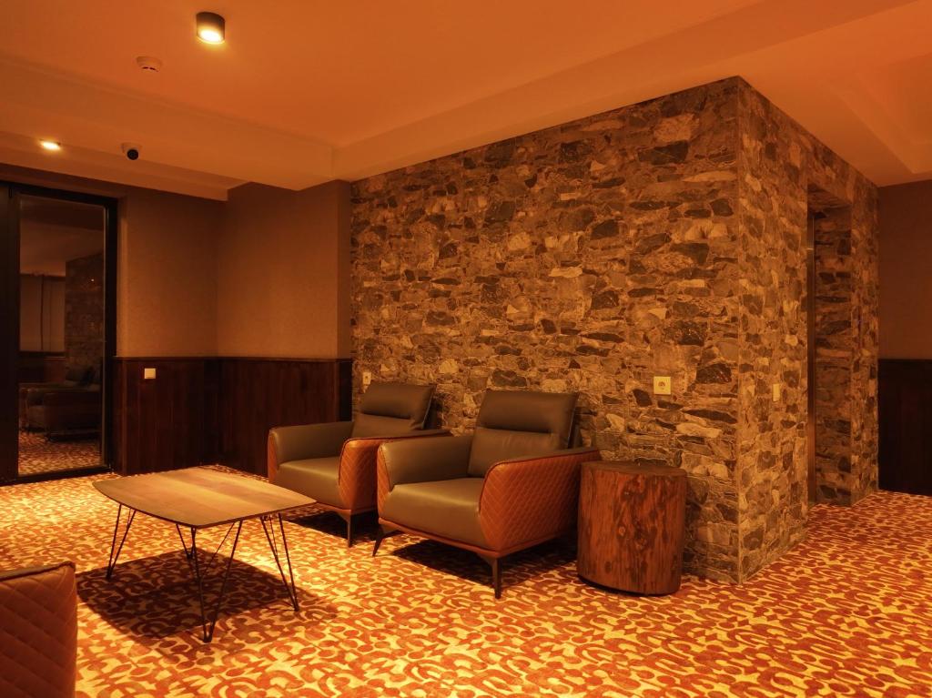Posezení v ubytování Hotel Ushba in Mestia