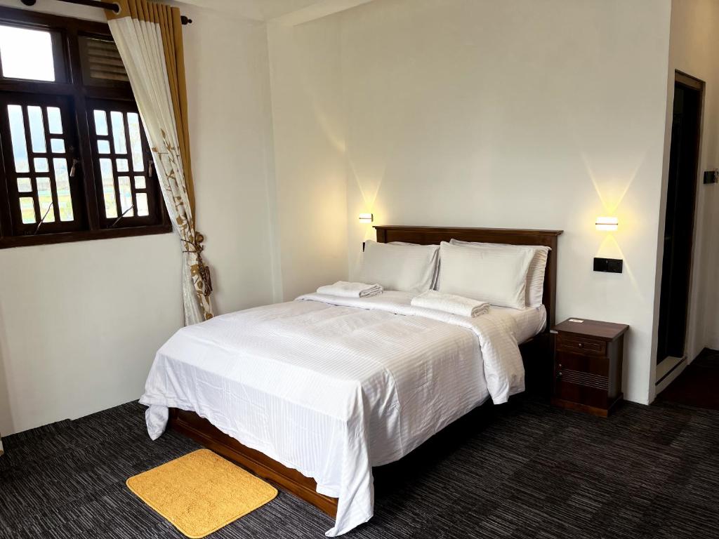 Ein Bett oder Betten in einem Zimmer der Unterkunft AGP home