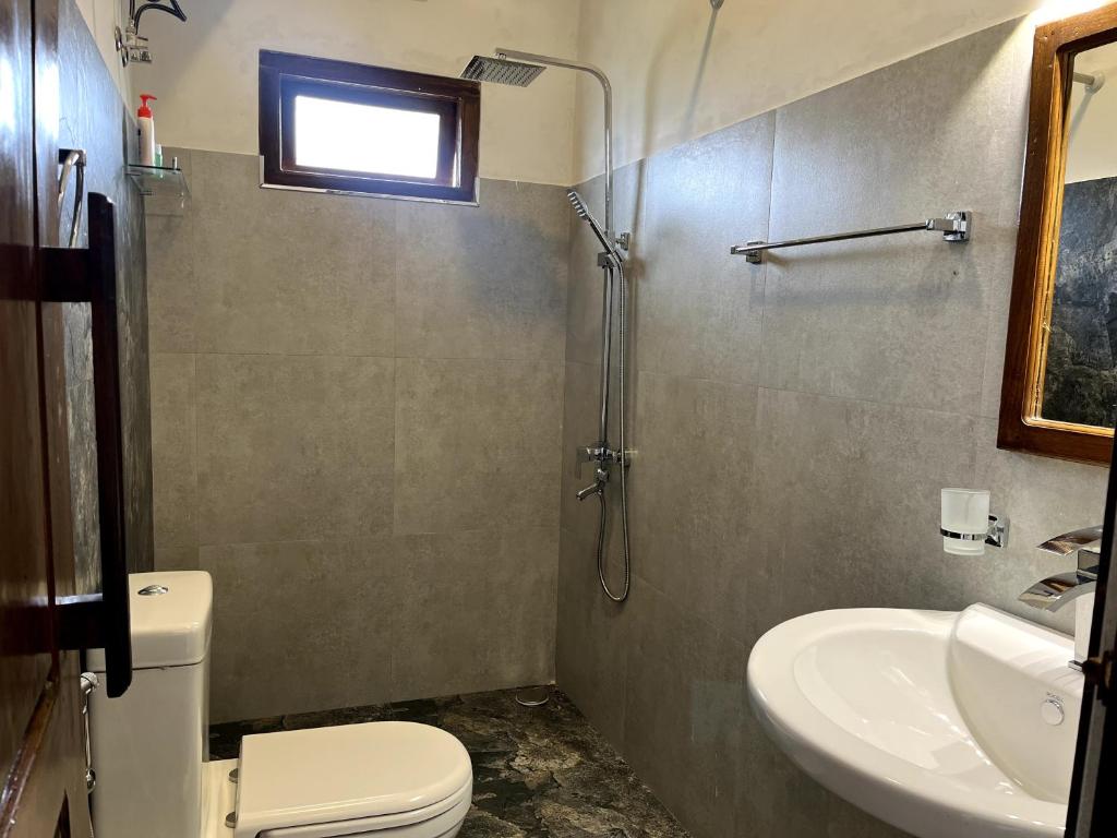 Ein Badezimmer in der Unterkunft AGP home