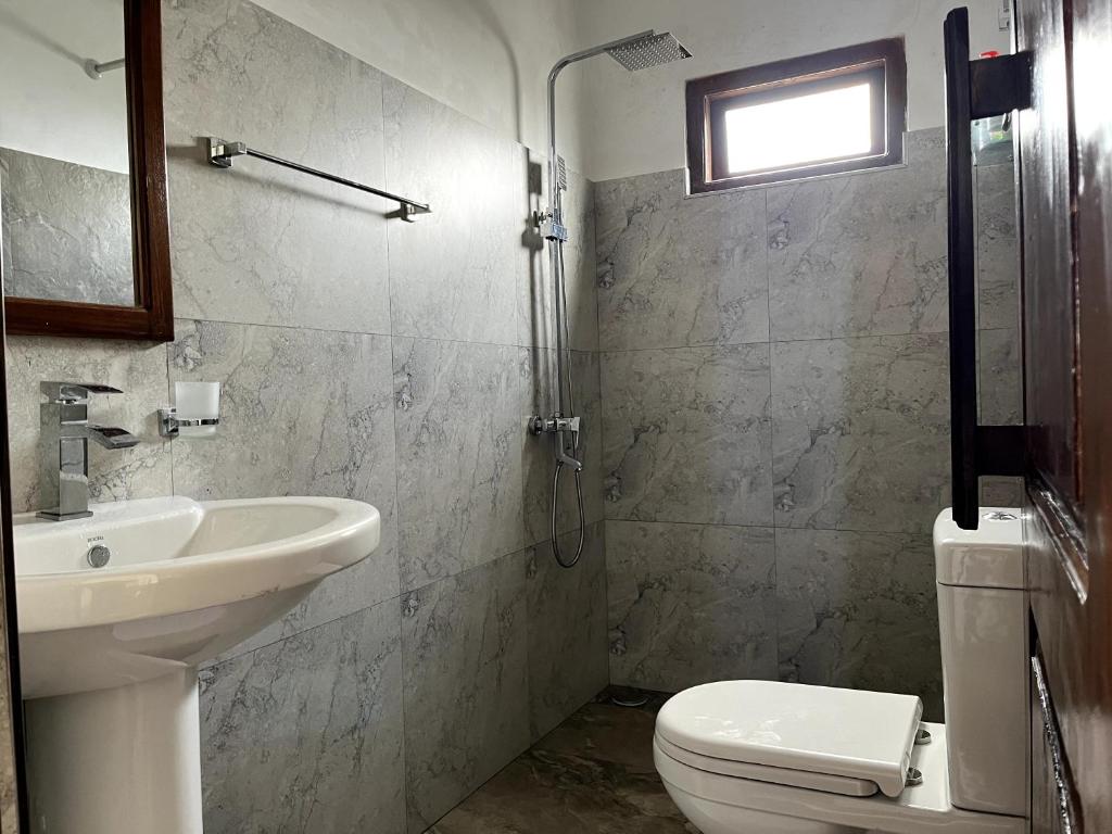 Ein Badezimmer in der Unterkunft AGP home