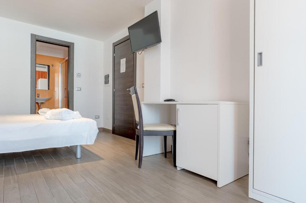 Postel nebo postele na pokoji v ubytování Nauticus Hotel Ugento