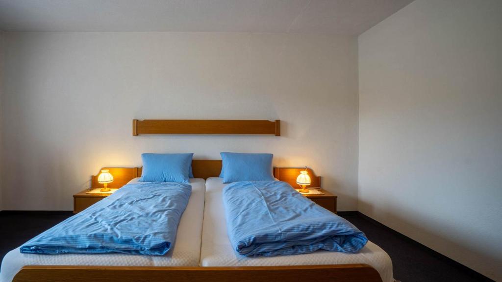 Postel nebo postele na pokoji v ubytování Pension Egg'spresso