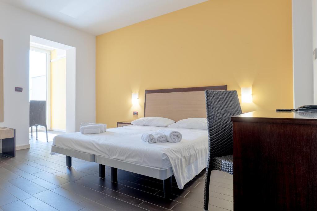 Postel nebo postele na pokoji v ubytování Nauticus Hotel Ugento