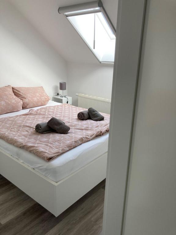 Postel nebo postele na pokoji v ubytování FeWo Lindenhof