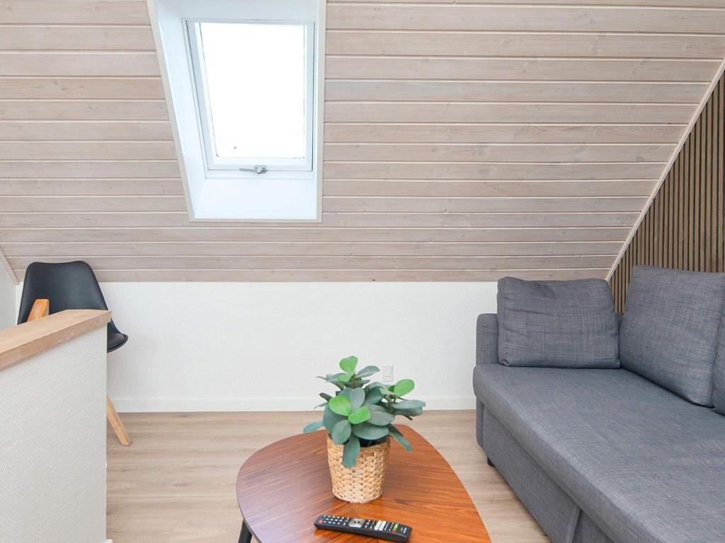 Posezení v ubytování 4 person holiday home in Sydals