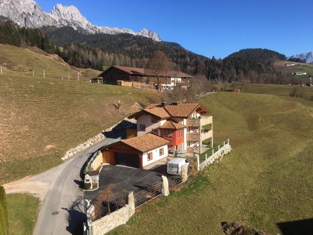 an aerial view of a house in a field at Ferienhaus Philipp Rofner in Leogang