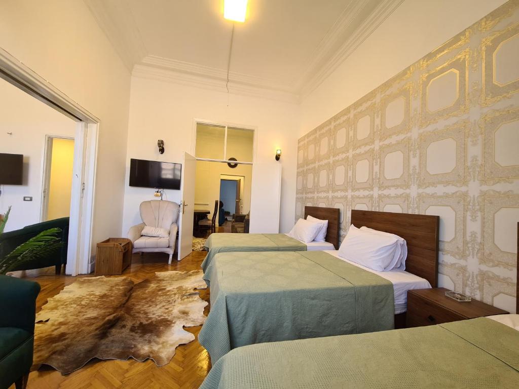 TV a/nebo společenská místnost v ubytování family suites cairo