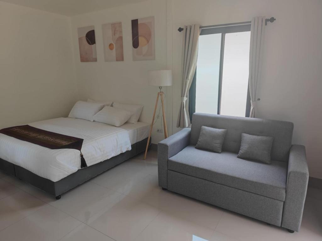 Un ou plusieurs lits dans un hébergement de l'établissement The Secret Garden Homestay Koh Yao Yai