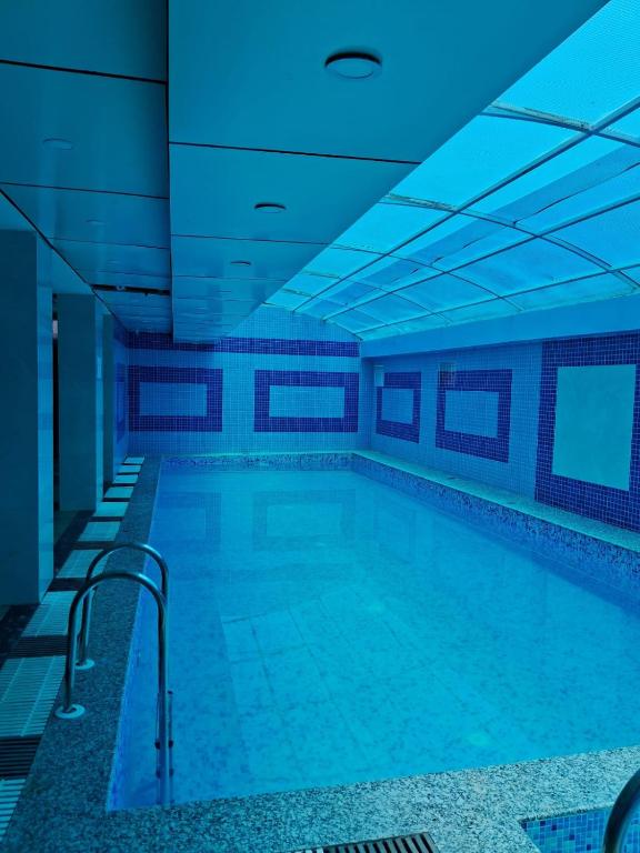 Bazén v ubytování HOTEL RINKY'S PALACE nebo v jeho okolí