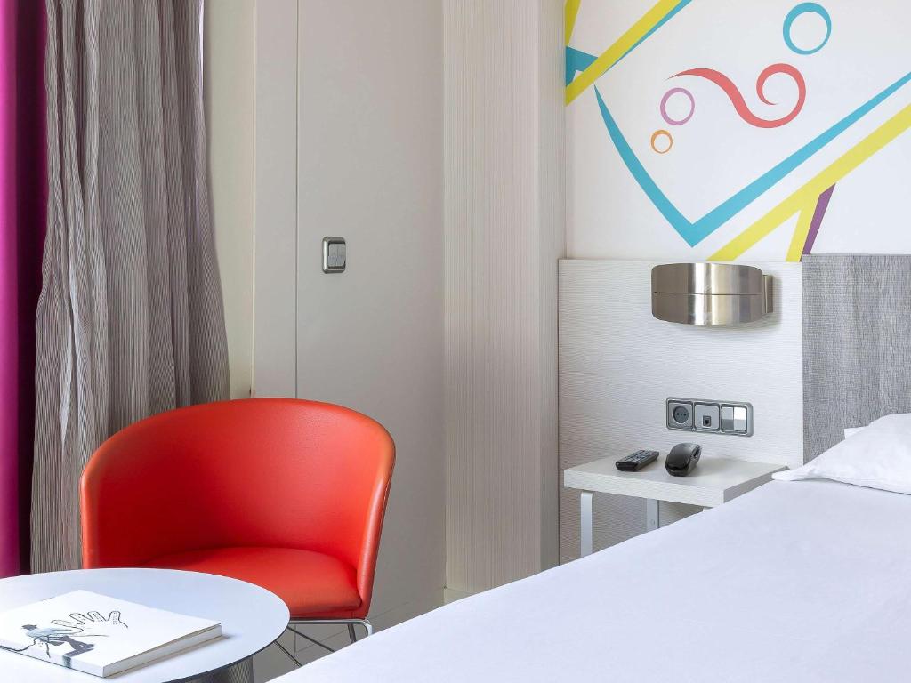 Posteľ alebo postele v izbe v ubytovaní Ibis Styles Madrid Prado
