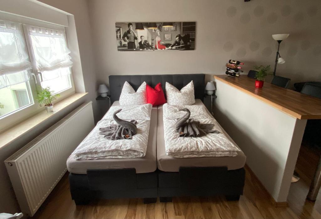 Postel nebo postele na pokoji v ubytování Ferienwohnung „Thea“