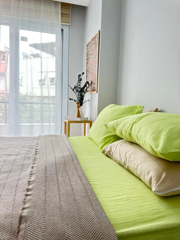 Postel nebo postele na pokoji v ubytování merkezde 2 odalı minimalist ev
