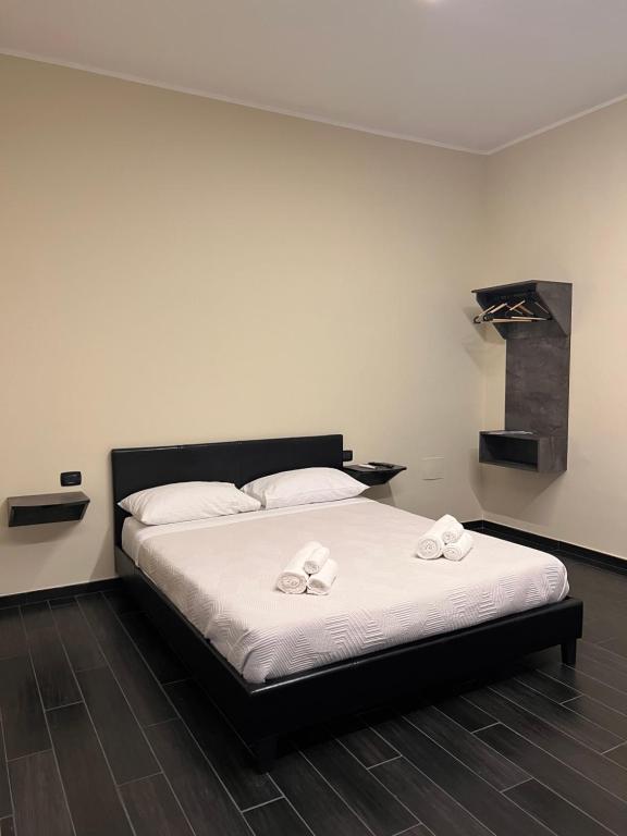 Postel nebo postele na pokoji v ubytování ASTRUM b&b