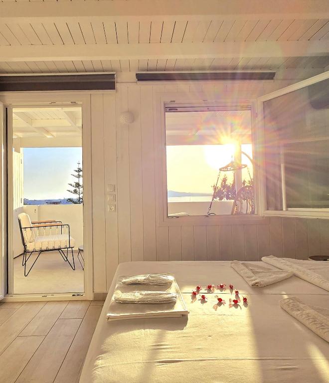 Postel nebo postele na pokoji v ubytování Aphrodite Boutique Hotel