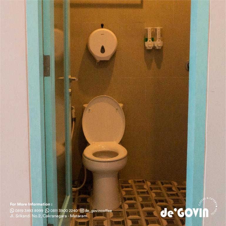 Koupelna v ubytování de'Govin Hotel
