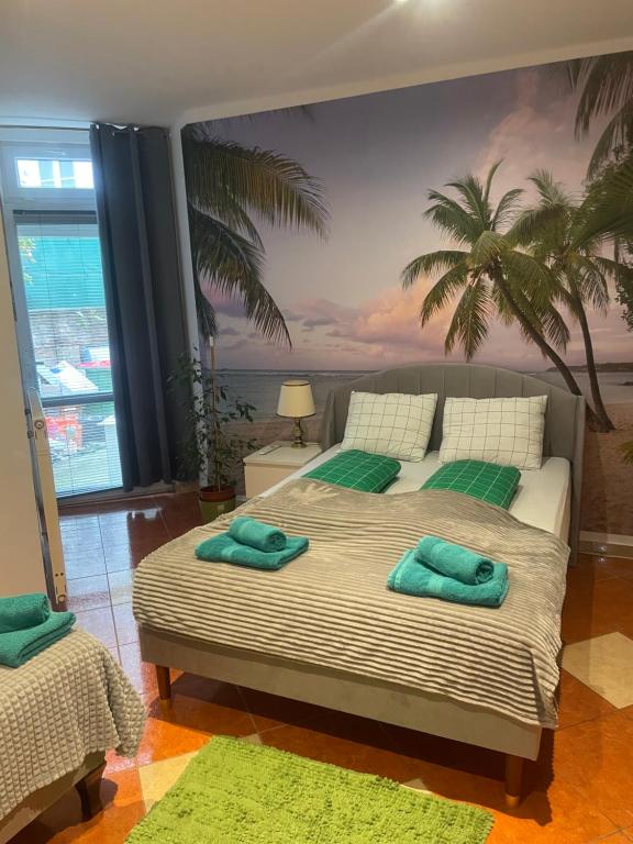 A bed or beds in a room at Viktoria ARTUR