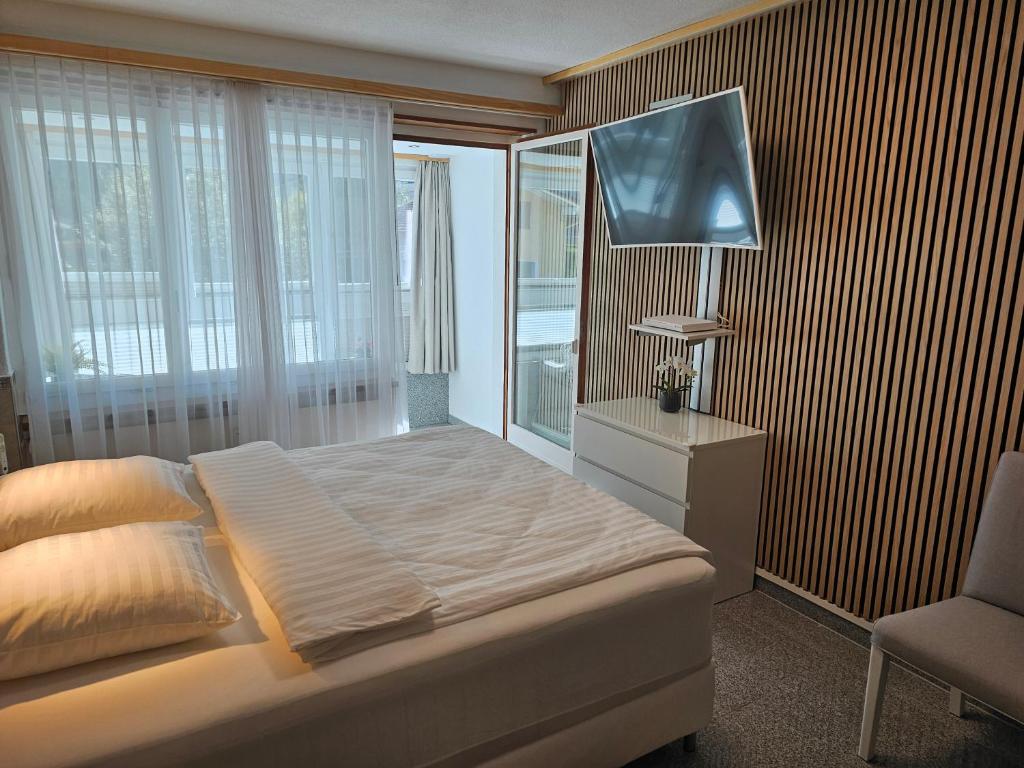 Postel nebo postele na pokoji v ubytování Motel 96