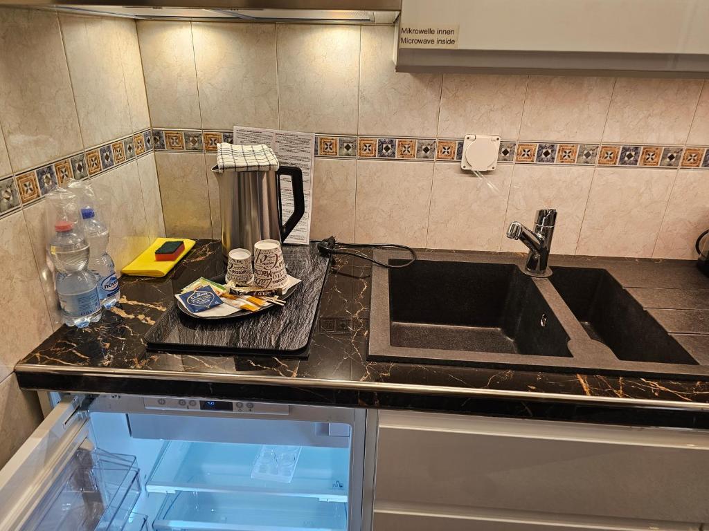 Kuchyň nebo kuchyňský kout v ubytování Motel 96