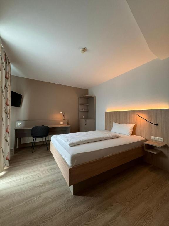 Postel nebo postele na pokoji v ubytování Hotel Feyrer