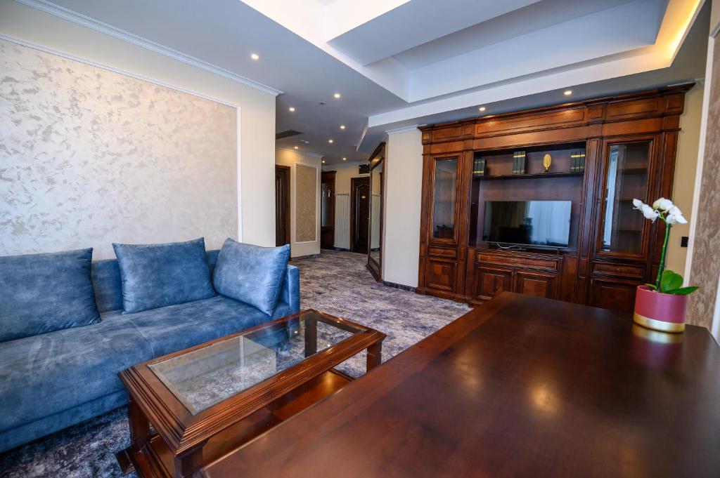 TV a/nebo společenská místnost v ubytování Hotel Bulevard