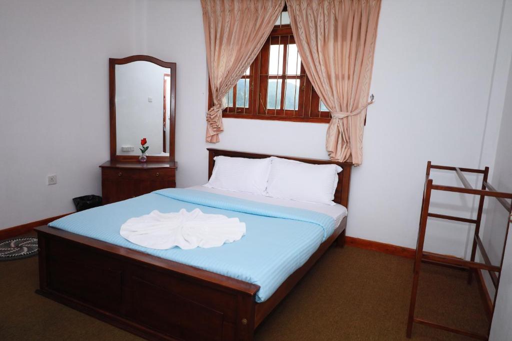 Postel nebo postele na pokoji v ubytování Asiri View Cottage