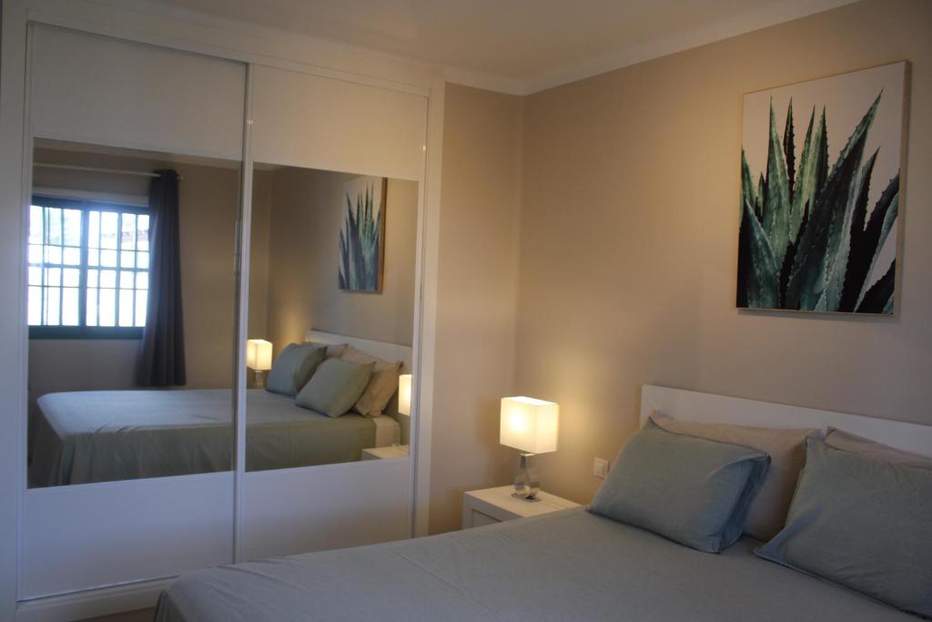 Posteľ alebo postele v izbe v ubytovaní El Piso del Puerto - Charm Apartment