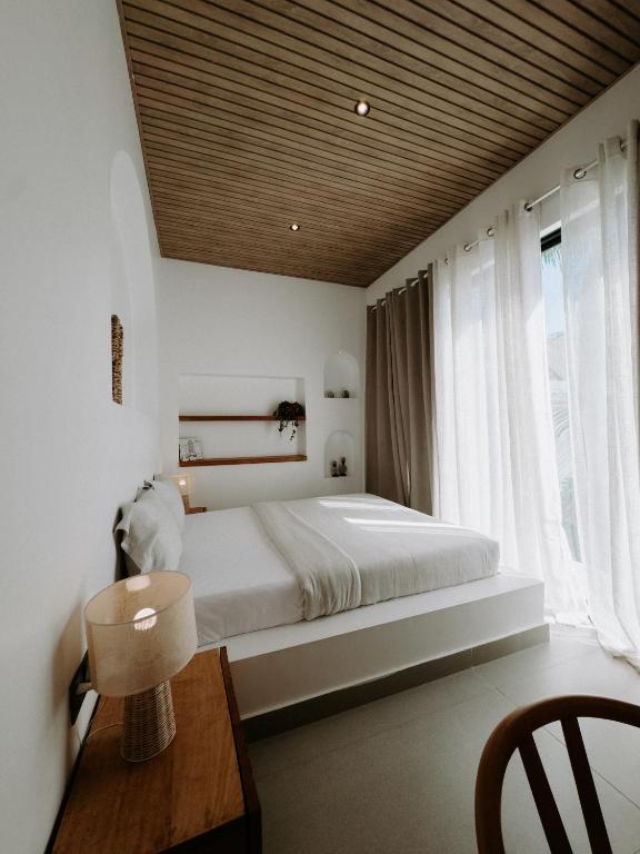 Postel nebo postele na pokoji v ubytování abode Zanzibar