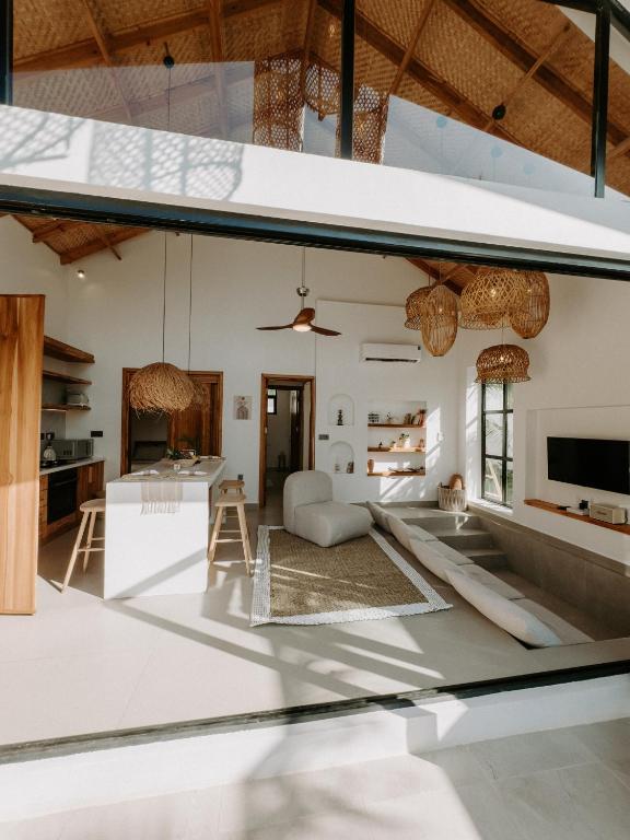 Postel nebo postele na pokoji v ubytování abode Zanzibar