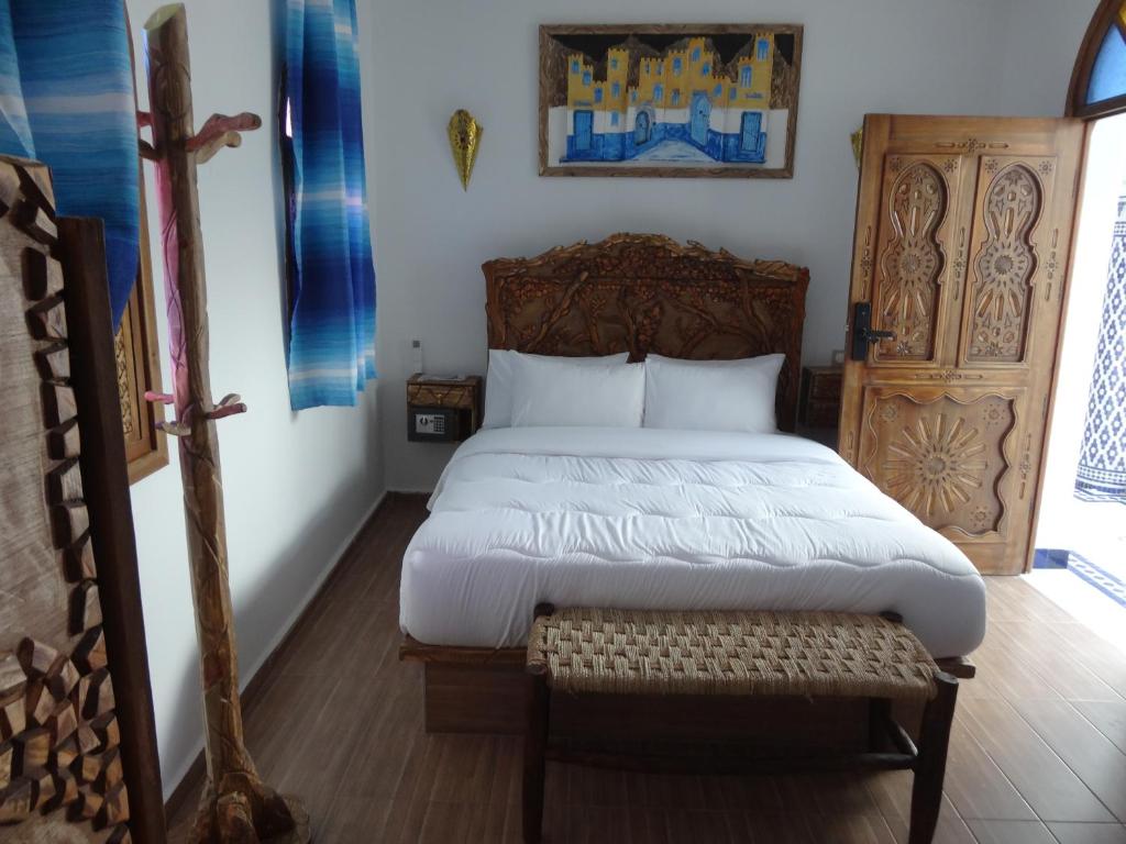 Postel nebo postele na pokoji v ubytování Palacio Del Sol