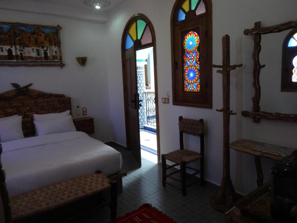 Postel nebo postele na pokoji v ubytování Palacio Del Sol