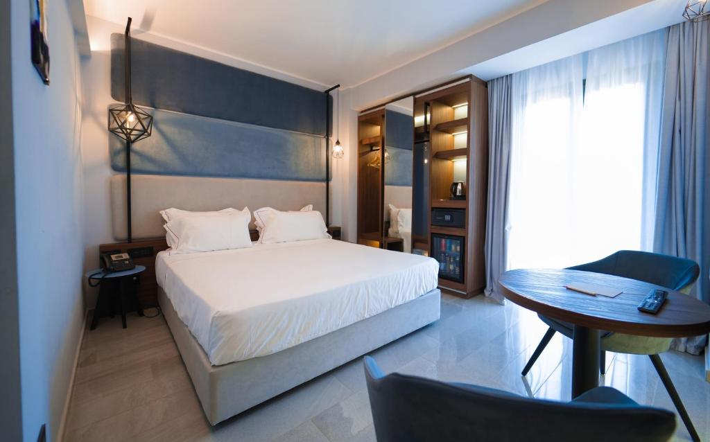Postel nebo postele na pokoji v ubytování Best Western Plus Sabaudia Hotel