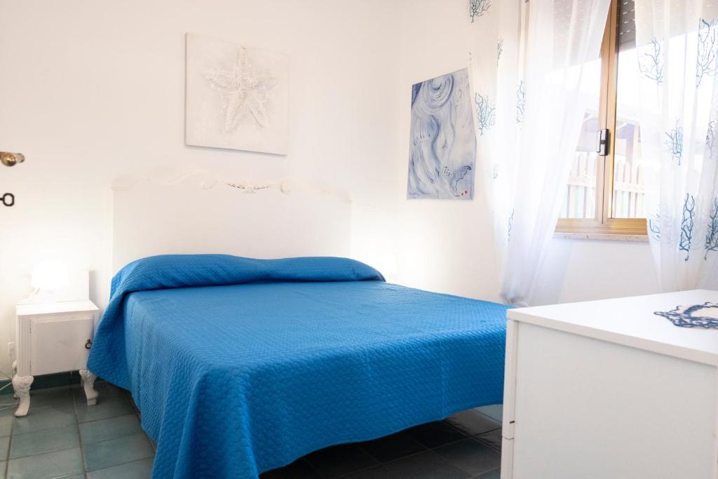 Posteľ alebo postele v izbe v ubytovaní Villa Jonny a due passi dal Mare