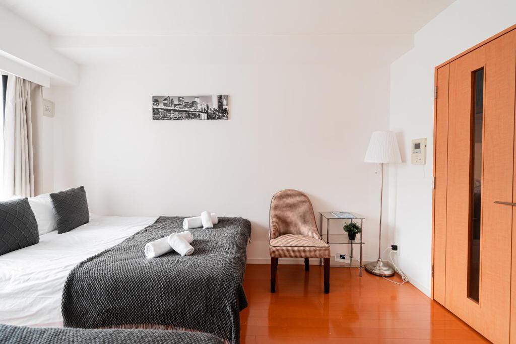 Shinjuku luxury Apart ment 2 minutes from Higashi-Shinjuku客房内的一张或多张床位