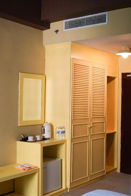 Příslušenství pro přípravu čaje a kávy v ubytování The Très Hotel