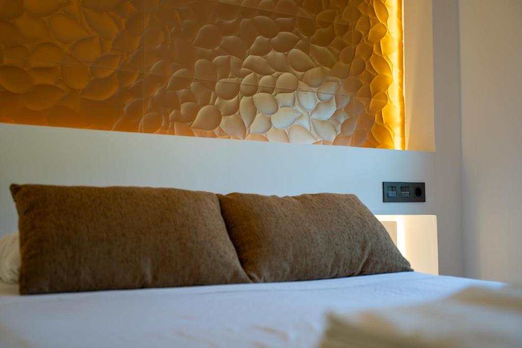 Postel nebo postele na pokoji v ubytování Apartamento para dos a los pies de la Alhambra