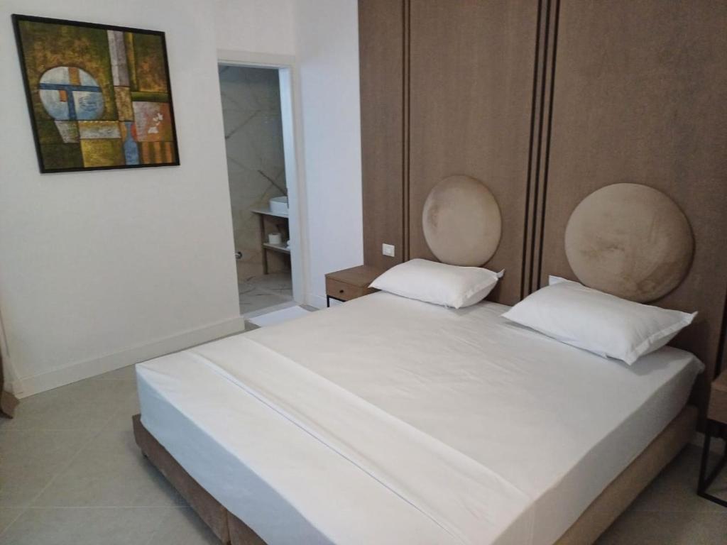 Postel nebo postele na pokoji v ubytování Oxygen Boutique Hotel