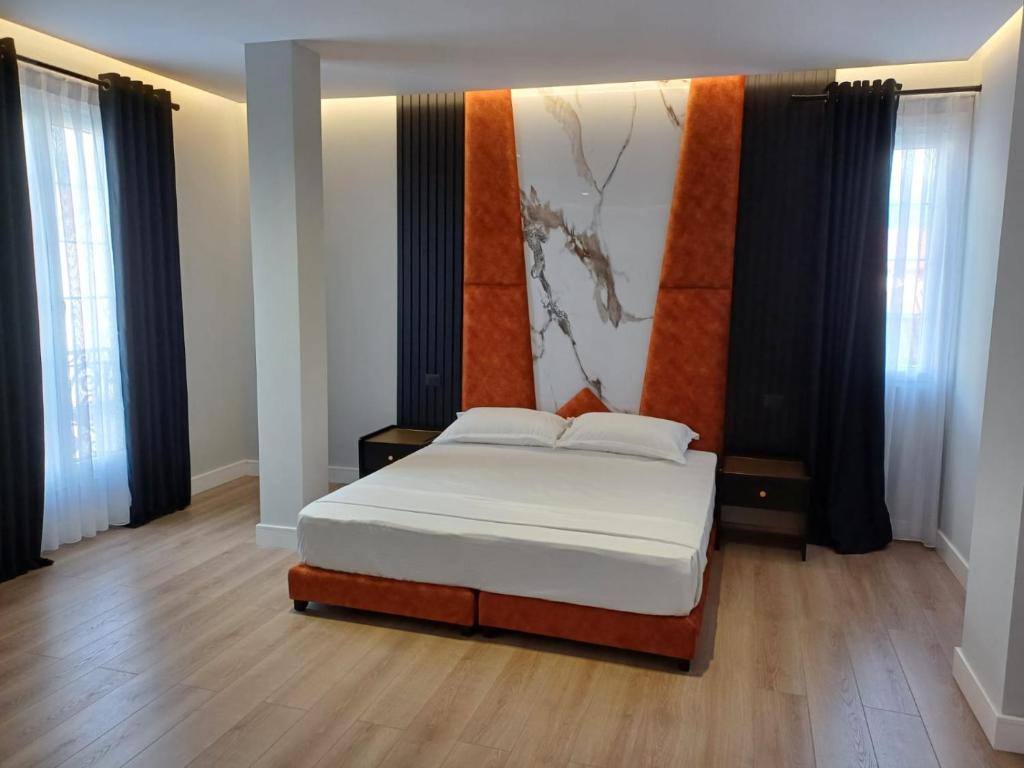 Postel nebo postele na pokoji v ubytování Oxygen Boutique Hotel