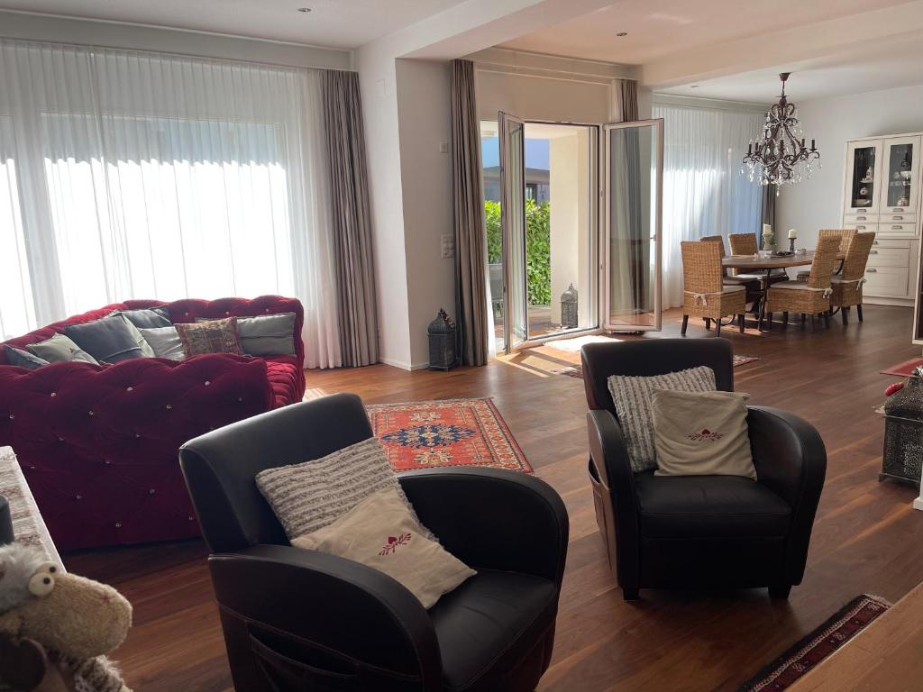 Posezení v ubytování Alpine City Suite