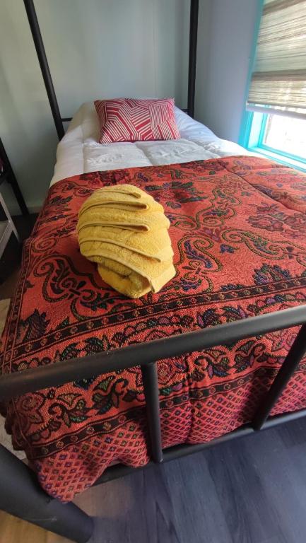 Postel nebo postele na pokoji v ubytování Hostel Kuntur