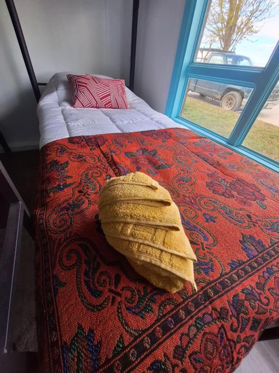 Postel nebo postele na pokoji v ubytování Hostel Kuntur