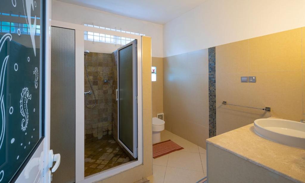 Koupelna v ubytování Twakila Sunset Suites