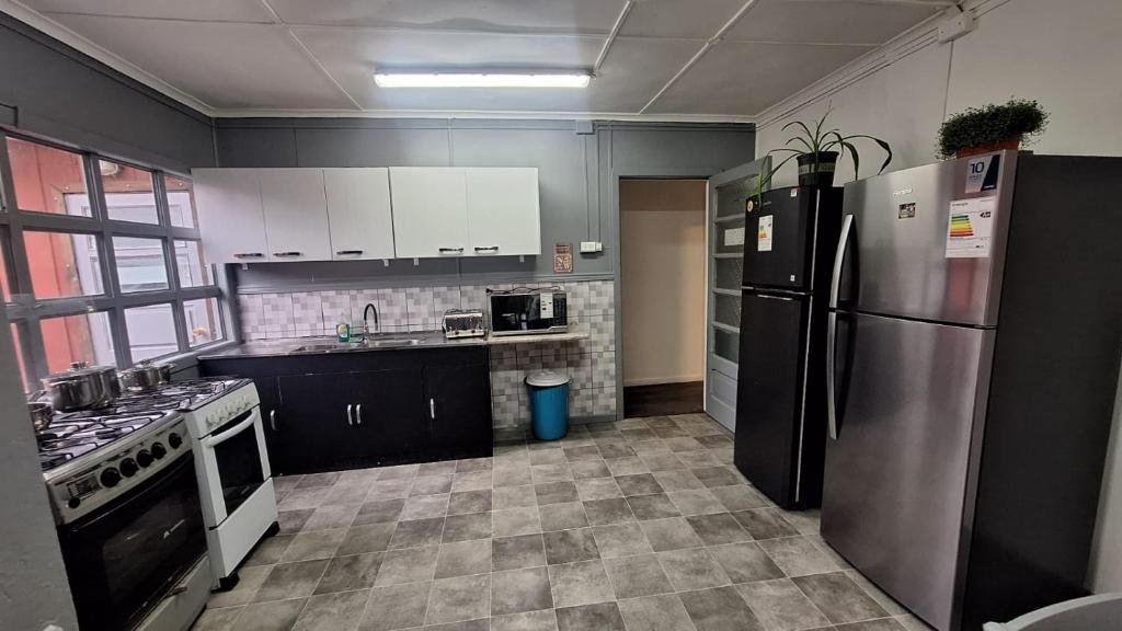 Kuchyň nebo kuchyňský kout v ubytování Hostel Kuntur