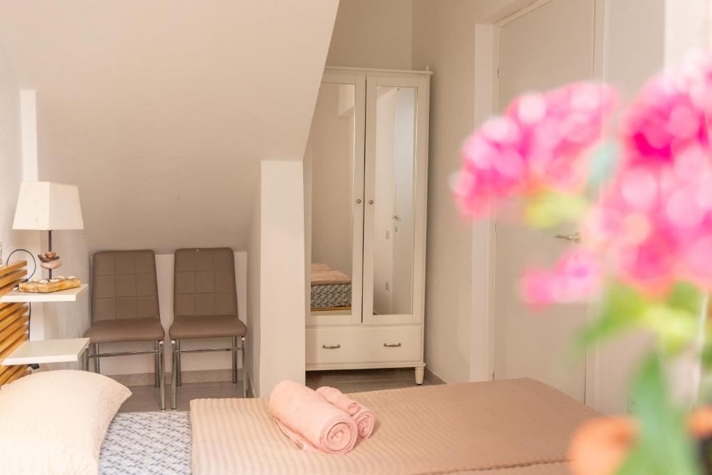 Łóżko lub łóżka w pokoju w obiekcie Casa Corona