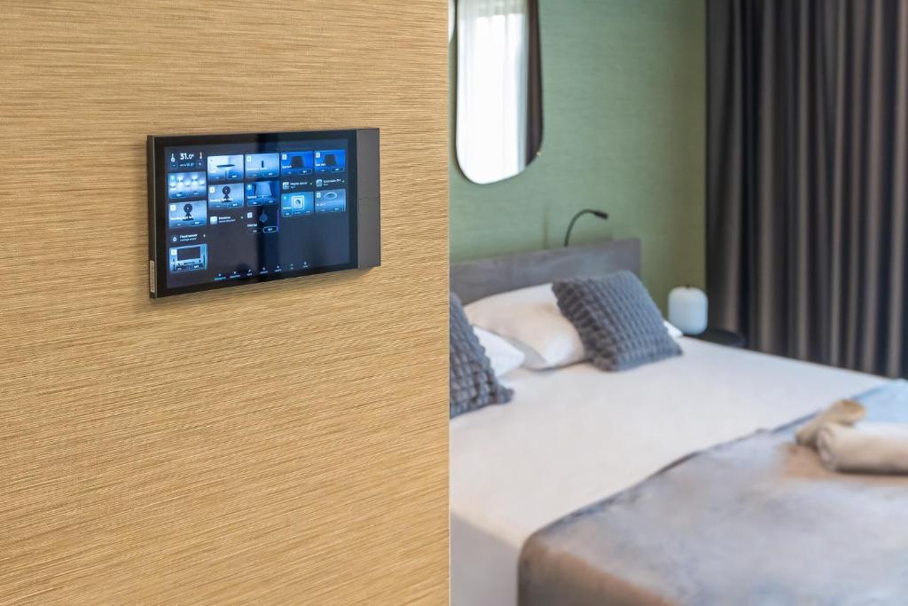 Postel nebo postele na pokoji v ubytování Hotel Experience