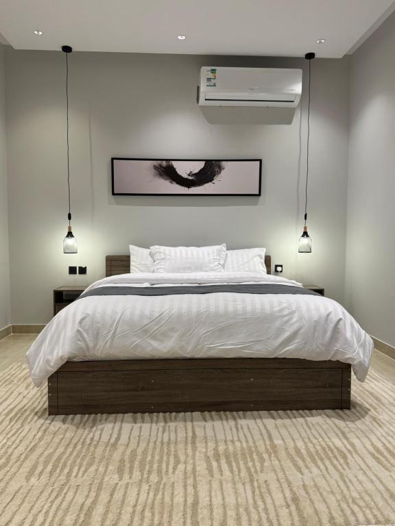 Katil atau katil-katil dalam bilik di KAYAN apartments