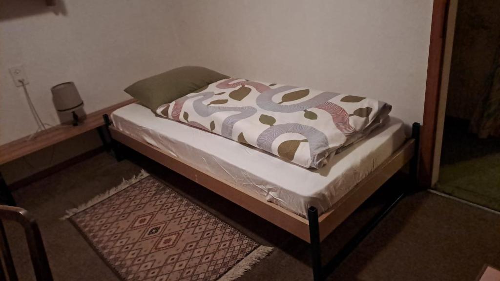 Postel nebo postele na pokoji v ubytování Haus in den Bergen