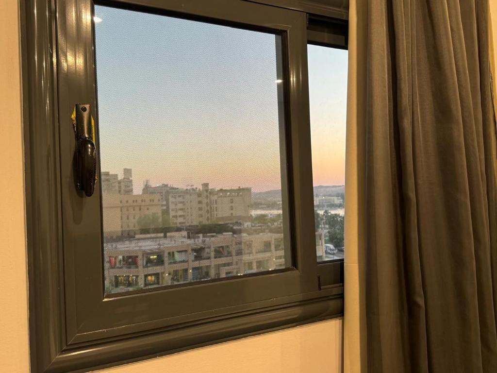 Nespecifikovaný výhled na destinaci Asuán nebo výhled na město při pohledu z hotelu