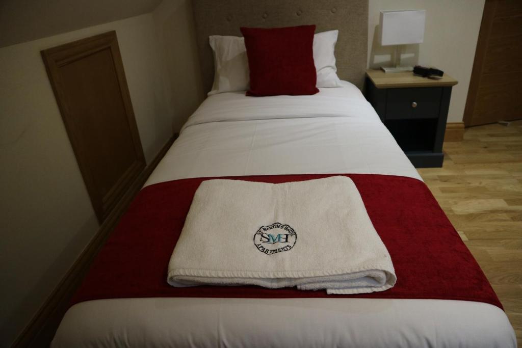 Postel nebo postele na pokoji v ubytování The Kew Rooms